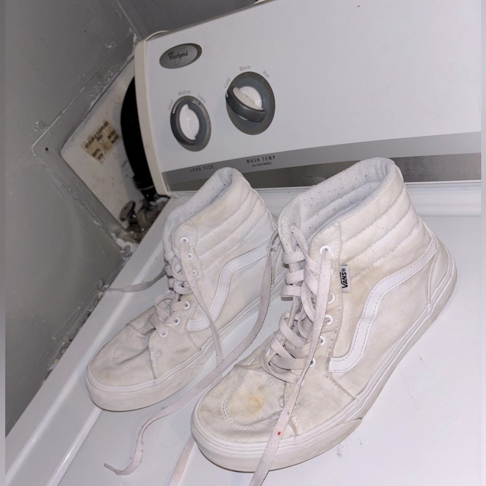 Youth size 5 would fit a women’s size 6 white hightop vans